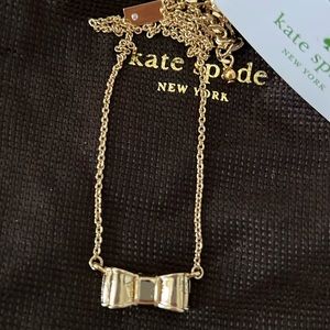Brand new, never worn Kate Spade gold bow necklace